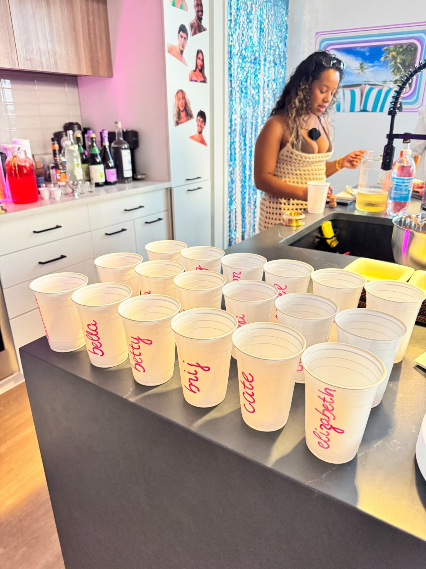 Personalized cups and decorations at Cate’s Love Island party