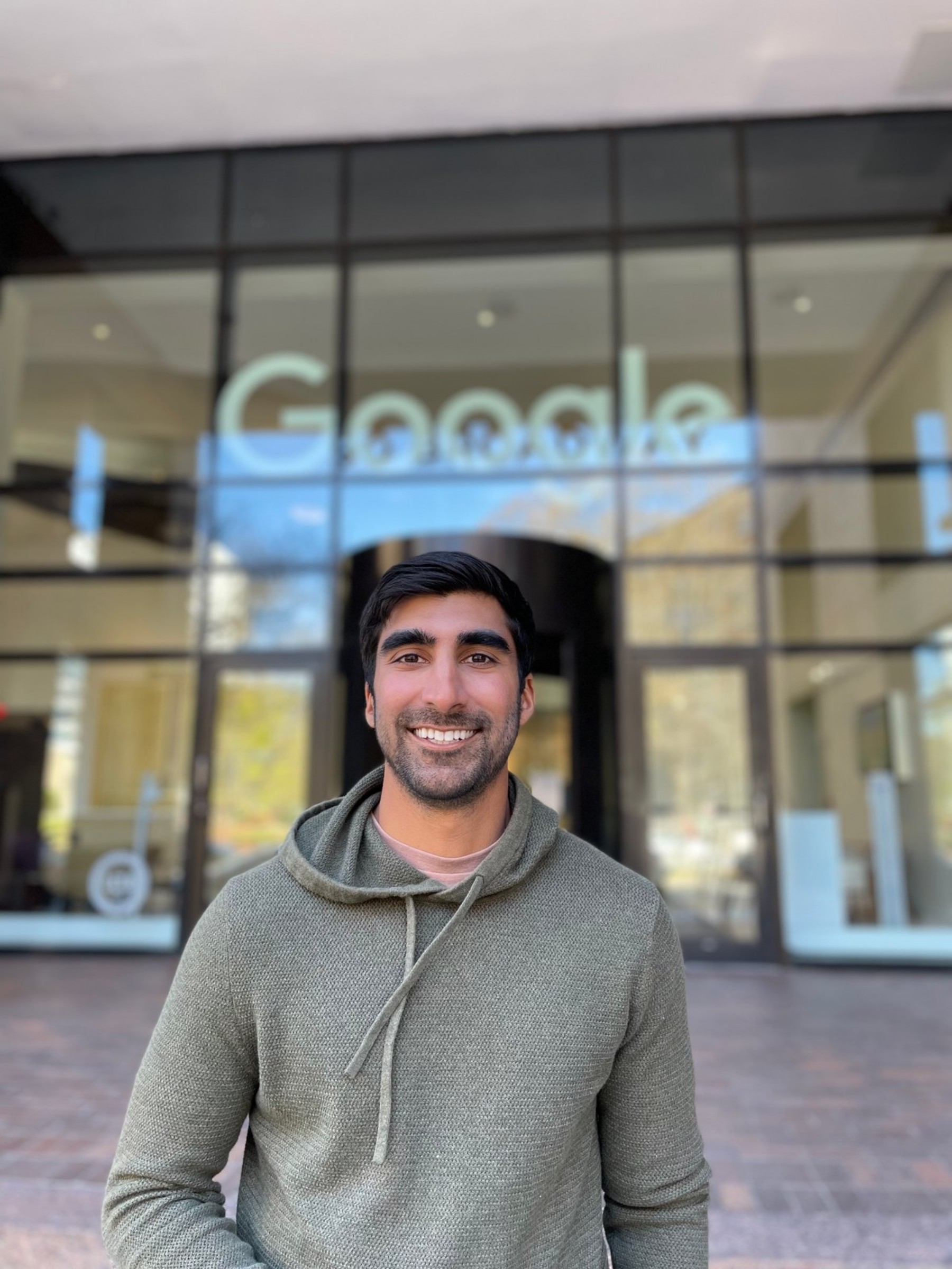 Brij outside the Google office in Boston
