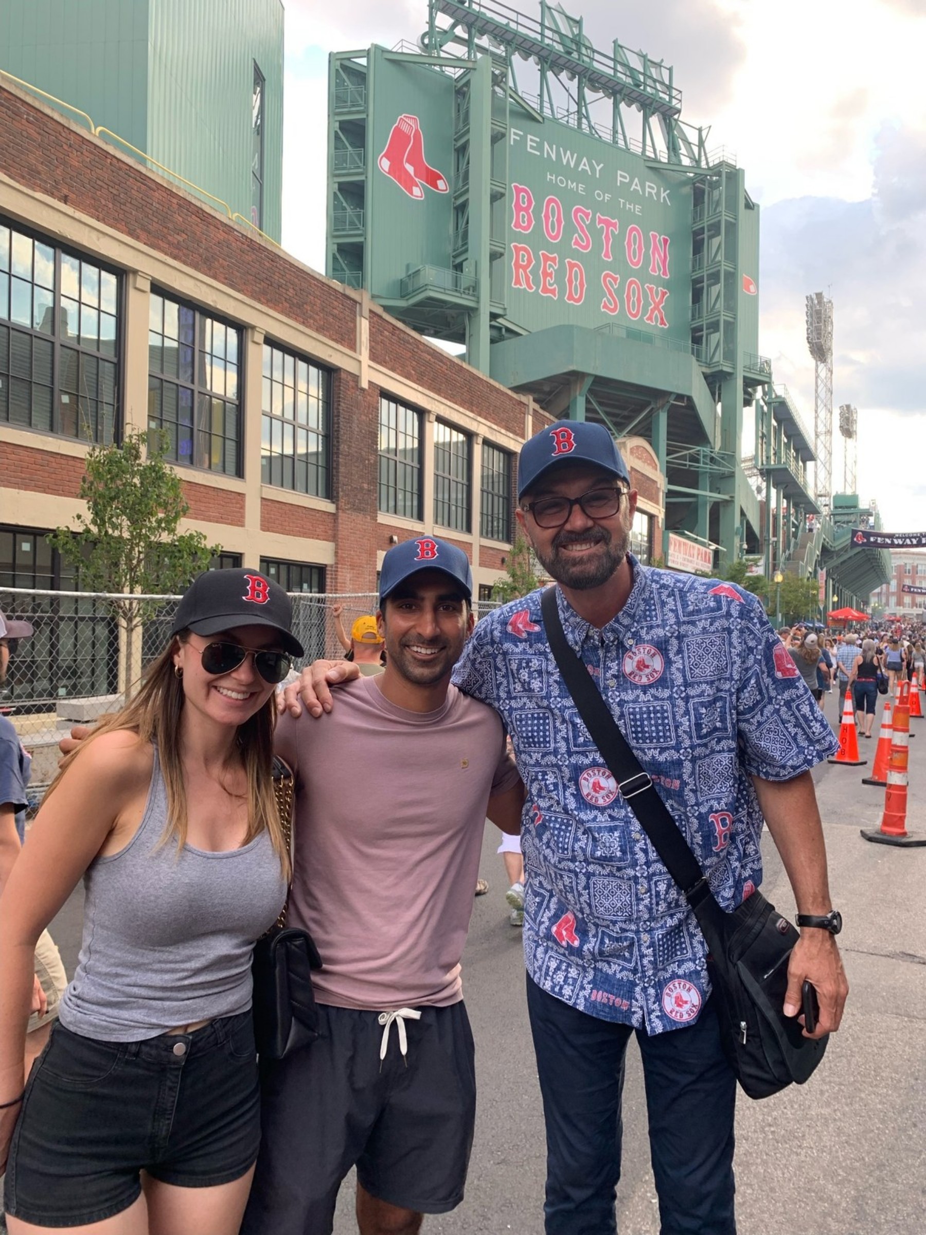 Cate and Brij with a friend outside Fenway Park
